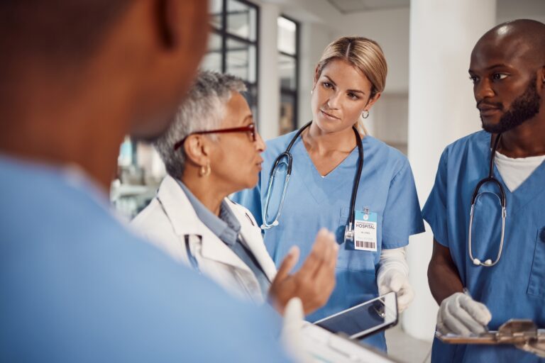 Group Of Nurse Listen To The Doctor